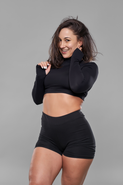 woman with brunette hair smiling